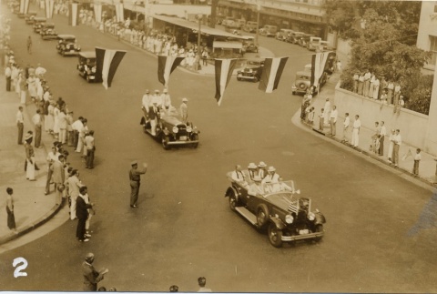 Cars in a parade (ddr-njpa-1-1590)