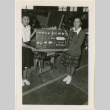 Girls hold up ship model parts (ddr-densho-37-1242)