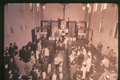 Funeral procession inside church (ddr-densho-330-18)