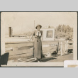 Woman standing on a pier (ddr-densho-316-104)