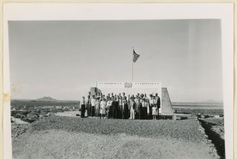 Group beside Gila River monument (ddr-densho-37-1465)