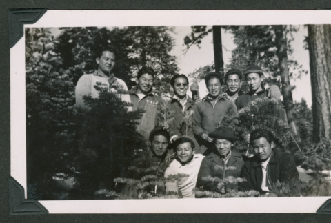 Group of men in forest (ddr-densho-550-269)