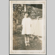 Girl by porch (ddr-densho-316-272)