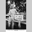Joe Iwataki standing next to sign reading:  Off Limits to Troops (ddr-ajah-2-818)