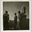 Soldiers next to a statue (ddr-densho-201-167)