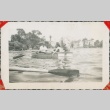 Group on a row boat (ddr-densho-321-1113)