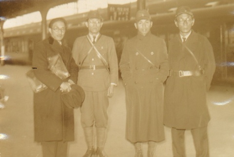 Teinosuke Kinugasa and others at Tokyo Station (ddr-njpa-4-442)