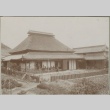 Family sitting on porch of Japanese-style house (ddr-densho-332-41)