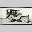 Death Valley, Cow Creek Camp. Josephine Hawes riding in a Jeep with children (ddr-densho-343-15)