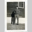 Soldier in front of a building (ddr-densho-22-167)