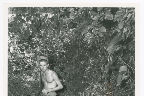 Pfc. Andrew J. Hines and dog Toby (ddr-densho-1007-102)