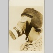 Woman modeling a gas mask (ddr-njpa-13-220)