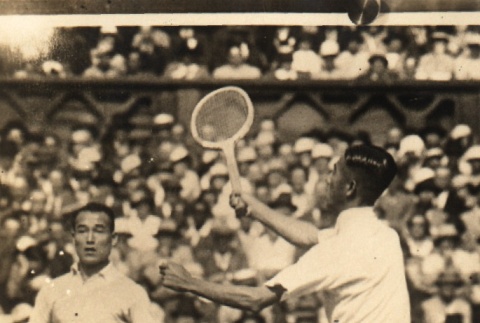 Two photos of Japanese tennis players and opponent team in a Wimbledon match (ddr-njpa-4-1536)