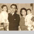 Military leader posing with wife and two small children (ddr-njpa-4-281)