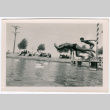 Six men diving into the water (ddr-densho-475-405)