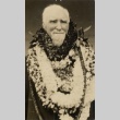 A man wearing leis (ddr-njpa-1-404)