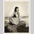 Woman with a camera (ddr-densho-542-829)