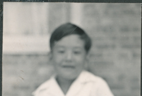 Chester Sakura Jr. making a face for the camera (ddr-densho-523-211)