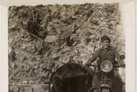 Man on motorcycle with sidecar (ddr-densho-466-386)