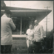 Couple with dog getting their picture taken (ddr-densho-523-271)