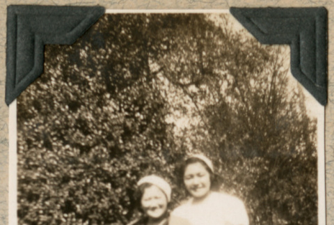 Two women standing on lawn (ddr-densho-383-110)