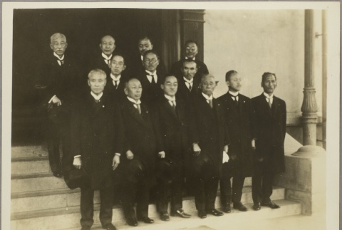 Group of men standing on steps (ddr-njpa-13-1540)
