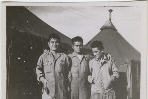 Three soldiers posed outside tents (ddr-densho-201-90)