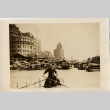 View from a river looking towards a city (ddr-njpa-6-57)