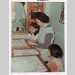 Sharon, Mary, and Lori Nakahara making mochi (ddr-densho-477-386)
