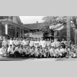 Members of SYNKOA in front of the Japanese Students Club clubhouse (ddr-densho-45-2)