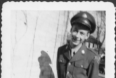 Man standing by wall (ddr-densho-434-451)