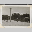 Row of men standing at attention (ddr-densho-466-758)
