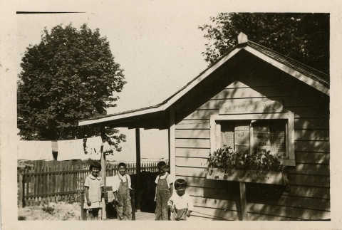 Nisei children in front of house (ddr-densho-182-79)