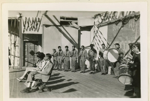 Girl Scout Drum Corps performing at a convention (ddr-densho-37-1115)