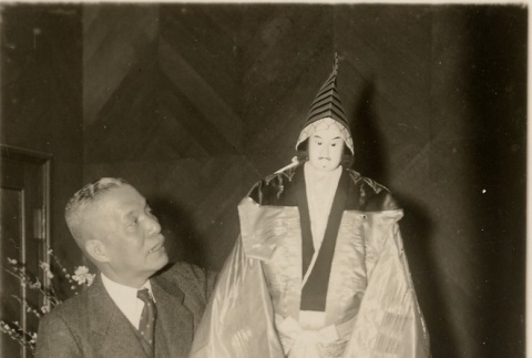 President Shirai with the sanboso doll for Wang Jingwei (ddr-njpa-1-1034)