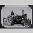 Man and boy on tractor (ddr-densho-359-1510)