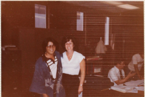 Two people standing in office (ddr-densho-426-1331)