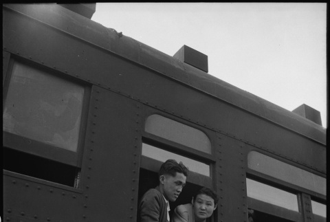 Japanese Americans saying goodbye from train (ddr-densho-151-297)