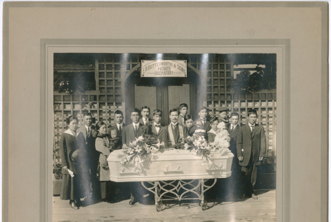 Funeral attendees around casket (ddr-densho-383-353)