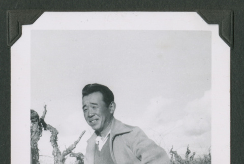 Man standing in a field (ddr-densho-471-183)