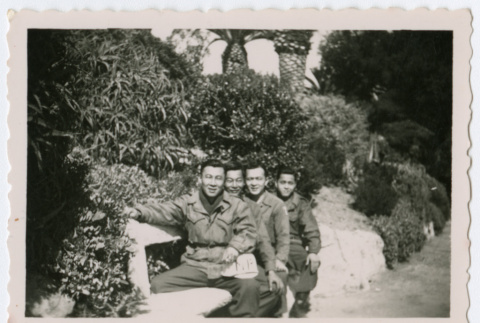 Soldiers sitting on park bench (ddr-densho-368-150)