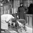 Woman and girl with bird in cage (ddr-densho-426-272)