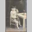 A young boy on the phone (ddr-densho-278-207)