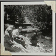 A group sitting next to a creek in Muir Woods (ddr-densho-300-302)