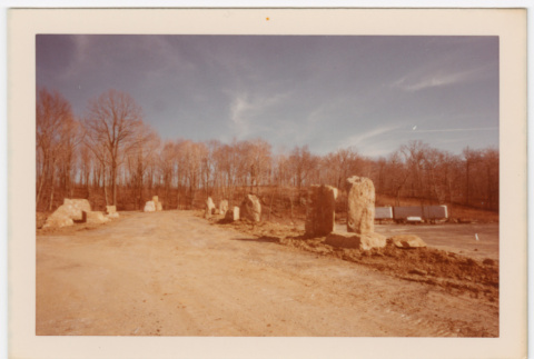 Rock pilars lining dirt road (ddr-densho-377-2173)
