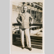 Man standing by railing of Japanese Pavilion at Golden Gate International Exposition (ddr-densho-426-1970)