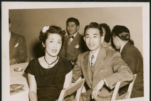 Couple sitting at a table (ddr-densho-379-485)