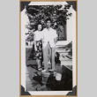 Man and woman standing outside a home (ddr-densho-542-333)