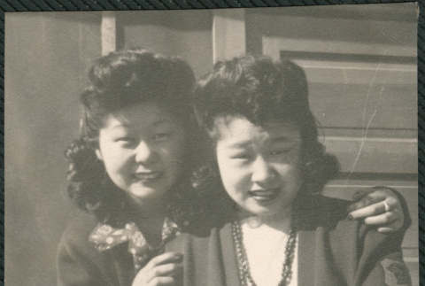 Two women outside barracks (ddr-densho-522-666)