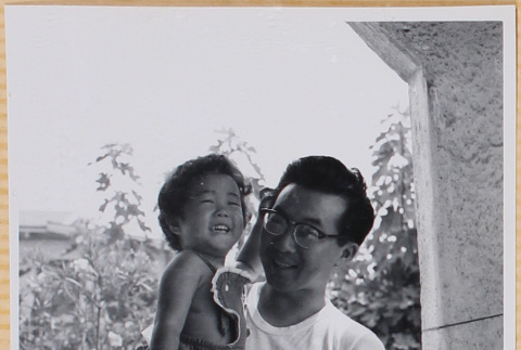 Hardy Shiomi holding Susan Shiomi (ddr-densho-522-244)